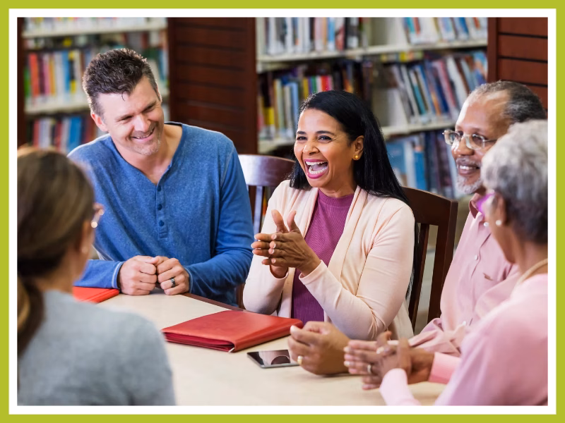 Adults speaking and enjoying each other's company